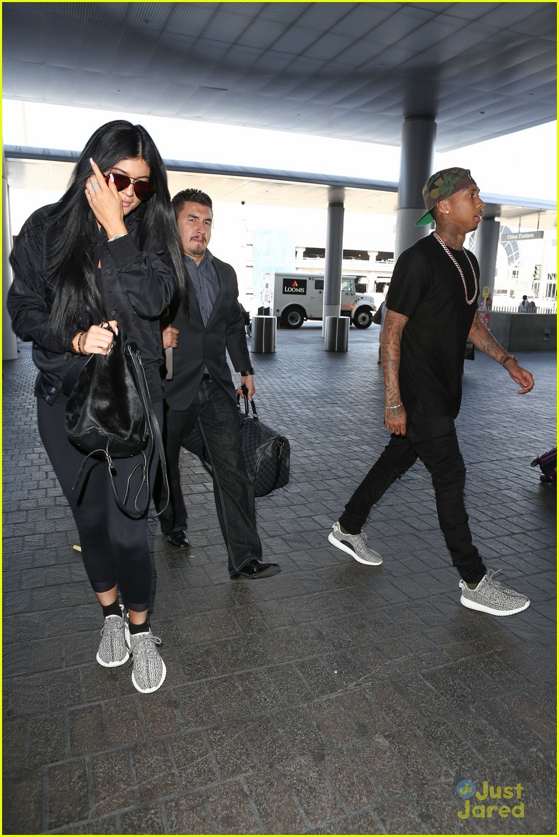 kylie jenner tyga coordinate outfits at lax airport 33