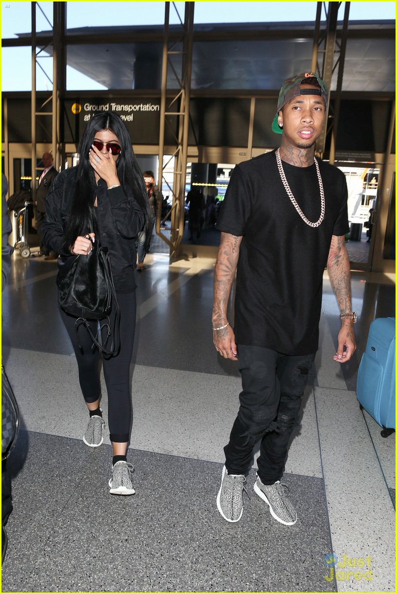kylie jenner tyga coordinate outfits at lax airport 36