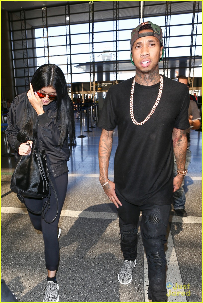 kylie jenner tyga coordinate outfits at lax airport 37