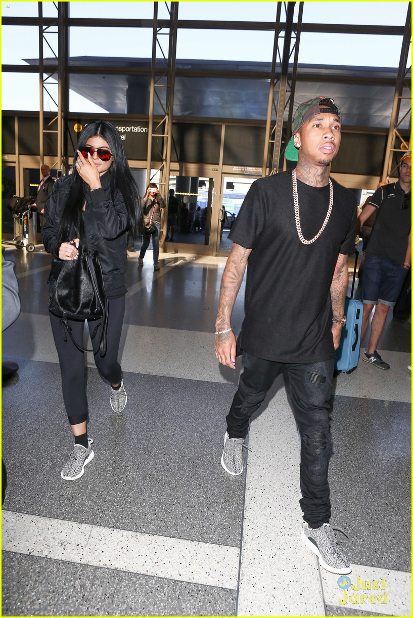 kylie jenner tyga coordinate outfits at lax airport 39
