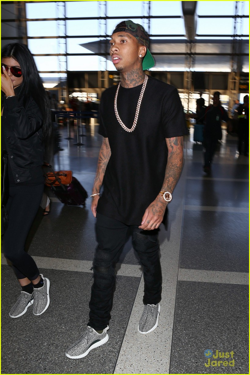 kylie jenner tyga coordinate outfits at lax airport 41
