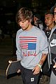 louis tomlinson seen holding hands with model tamara bell 02