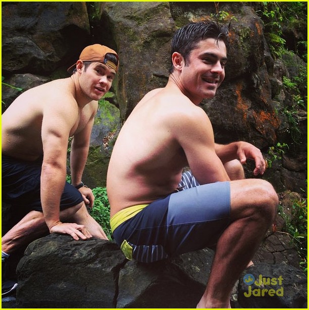 zac efron goes shirtless for waterfull jumping 03