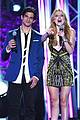 bella thorne brings boyfriend gregg sulkin on stage at mtv fandom awards 07