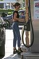 kendall jenner bares midriff in a crop top while getting gas 19