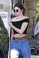kendall jenner bares midriff in a crop top while getting gas 26