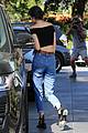 kendall jenner bares midriff in a crop top while getting gas 32