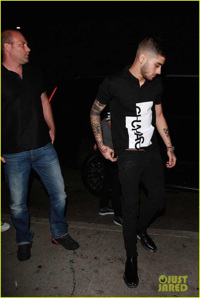 zayn malik celebrates solo record deal with night out 06