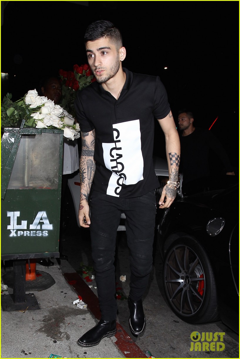 zayn malik celebrates solo record deal with night out 09