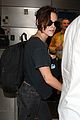 kristen stewart looks casual for lax departure before july 4th 04