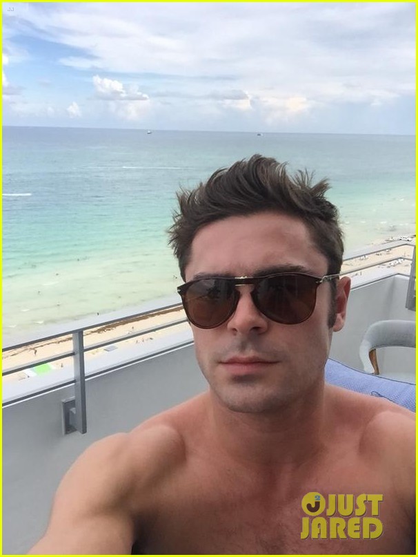 zac efron snaps a shirtless selfie on his hotel balcony 03