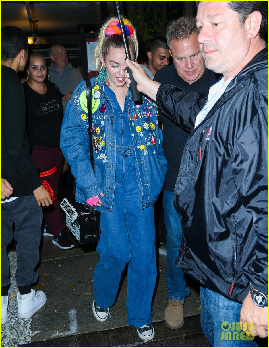miley cyrus does double denim after snl rehearsal 18