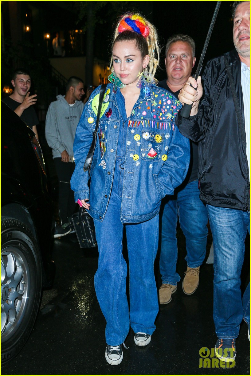 miley cyrus does double denim after snl rehearsal 33