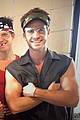 liam hemsworth flexes biceps on set for an upcoming skit 03