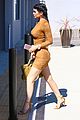 kylie jenner flaunts her curves in skin tight dress 16