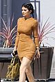 kylie jenner flaunts her curves in skin tight dress 17