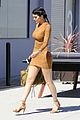 kylie jenner flaunts her curves in skin tight dress 24