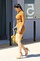 kylie jenner flaunts her curves in skin tight dress 25