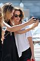 kristen stewart snaps selfies with fans upon leaving venice 04