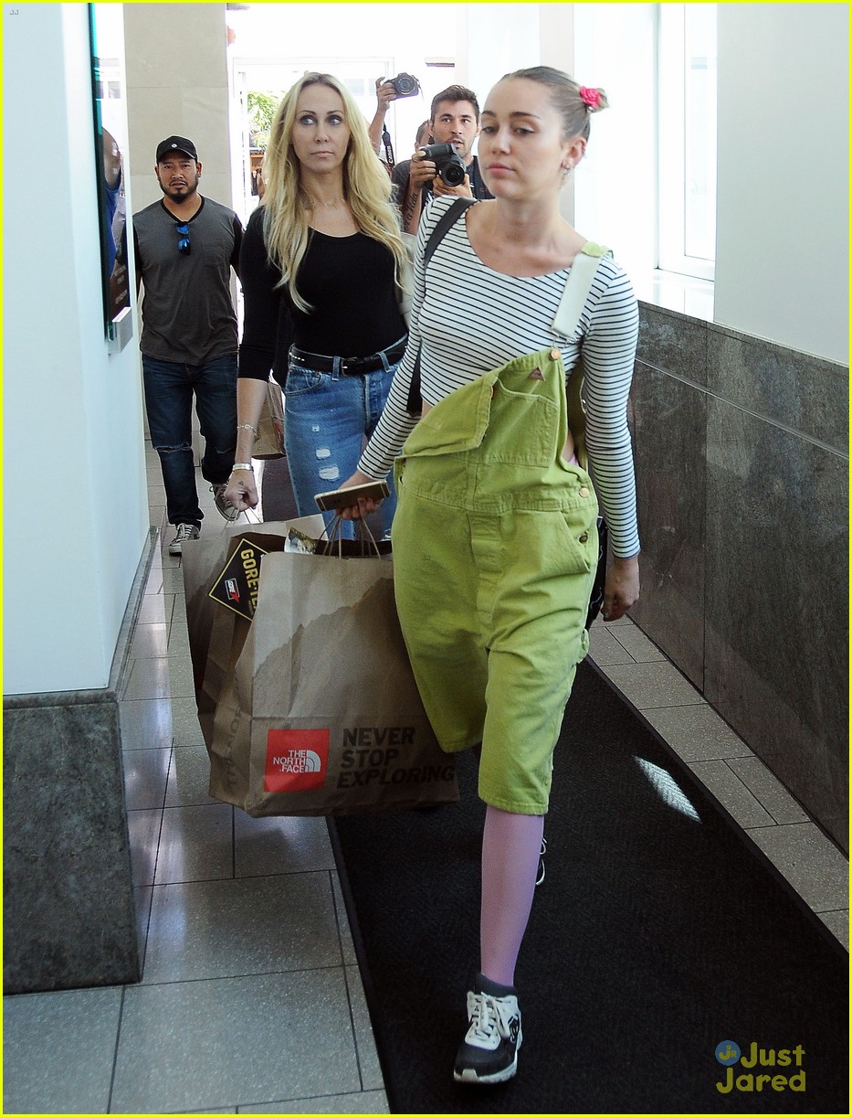 Miley Cyrus Short Overalls Over Tights