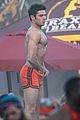 zac efron sticks hand in shorts flaunts eight pack abs 05