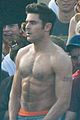 zac efron sticks hand in shorts flaunts eight pack abs 06
