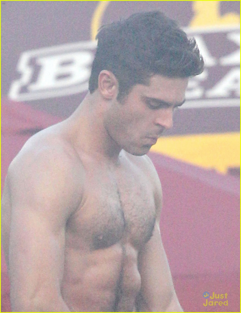 zac efron sticks hand in shorts flaunts eight pack abs 12