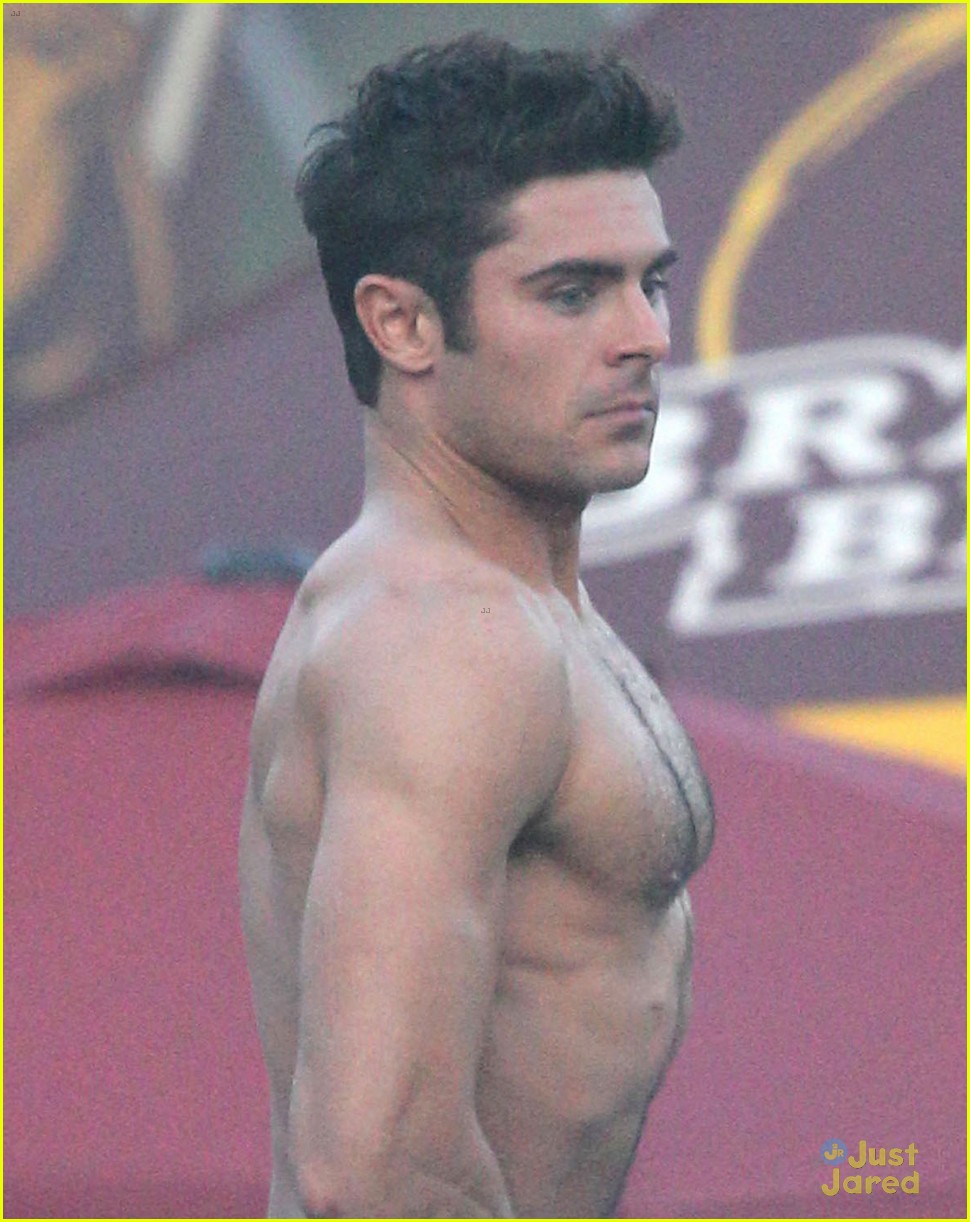 zac efron sticks hand in shorts flaunts eight pack abs 15