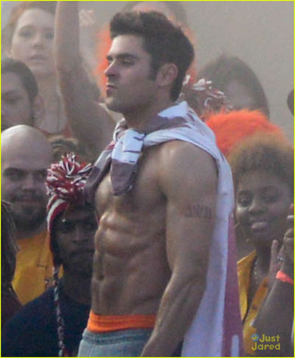zac efron sticks hand in shorts flaunts eight pack abs 16