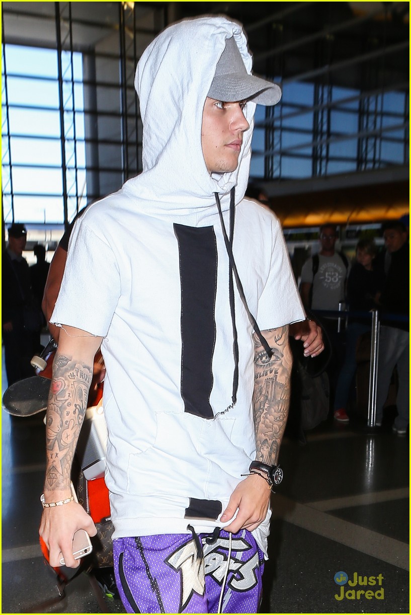 justin bieber skillrex sorry out friday london arrival 17