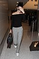 kendall jenner face hide lax arrival 08