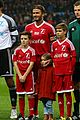 david beckham brings his 4 kids to charity soccer game 05