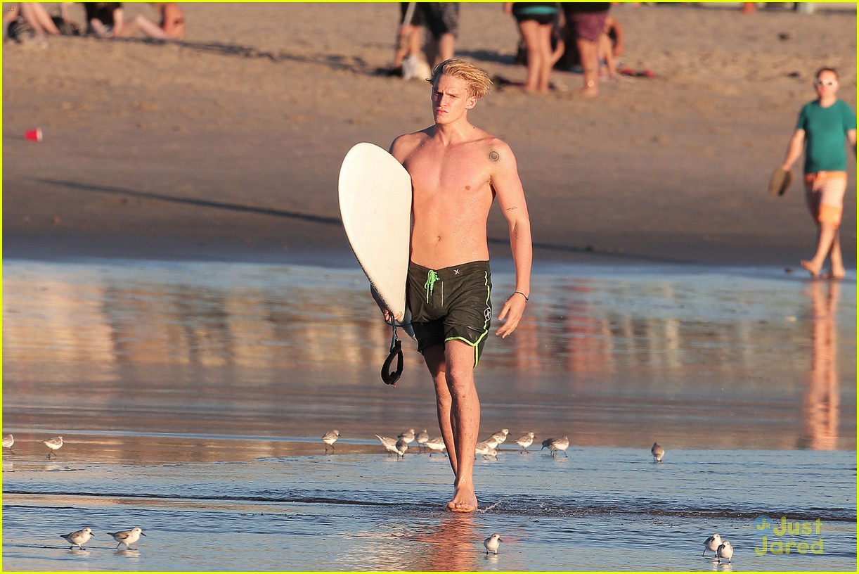 cody simpson shirtless surfing waves 03