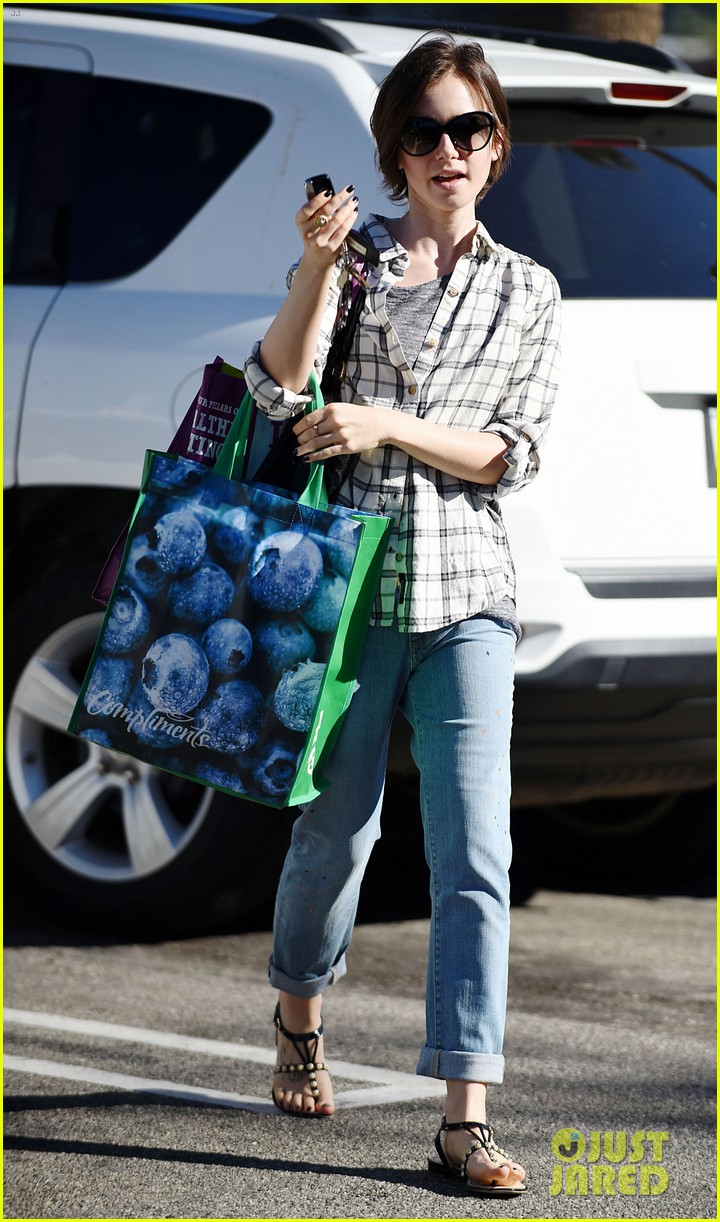lily collins grabs groceries and her cleaners 06