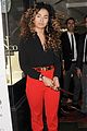 ella eyre looks her earrings over her face 14