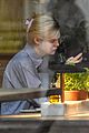 elle fanning steps out in rainy nyc 02