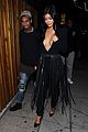 kylie jenner wears a low cut top on date night with tyga 32
