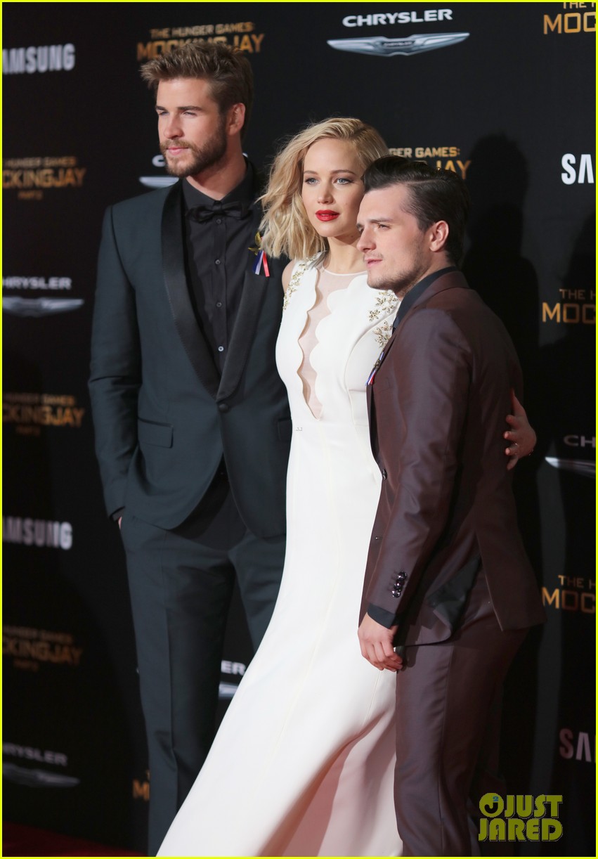 Liam Hemsworth and Josh Hutcherson attend The Hunger Games