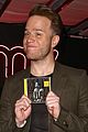 olly murs smirks while posing with special edition cd 04