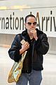 daisy ridley arrives at the london airport 02