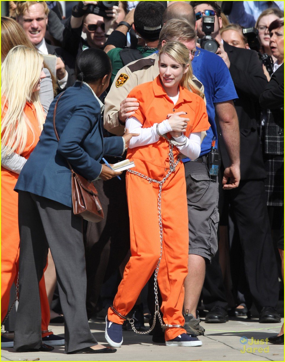 Emma Roberts & Abigail Breslin Trade In Pink Chic For Orange Jumpsuits ...