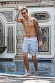 justin bieber goes shirtless for swim at versace mansion 01
