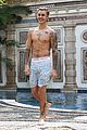 justin bieber goes shirtless for swim at versace mansion 25