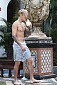 justin bieber goes shirtless for swim at versace mansion 35