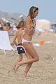 katie cassidy continues beach vacation 01
