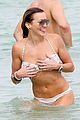 katie cassidy continues beach vacation 06