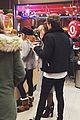 louis tomlinson danielle campbell hold hands chicago 01