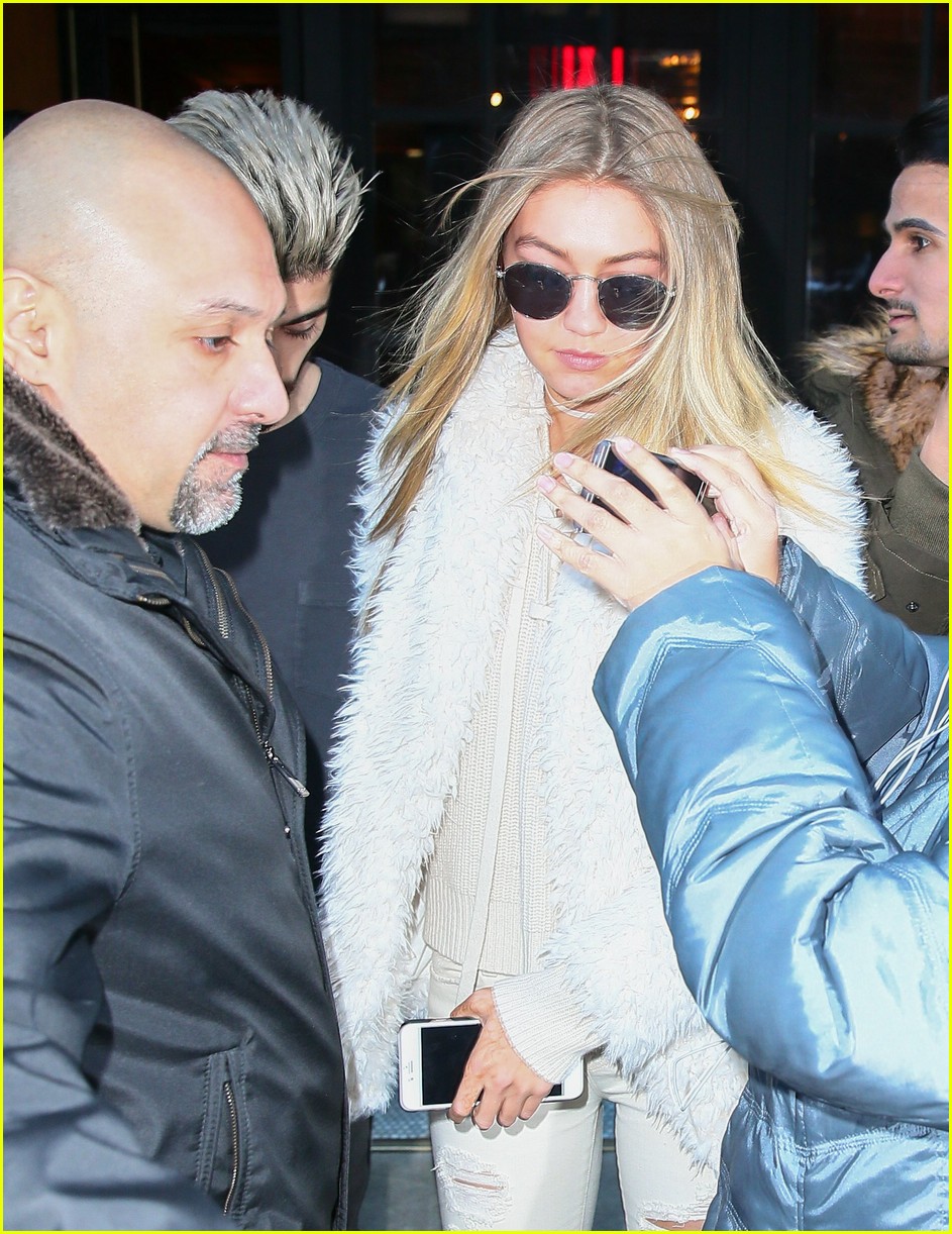 gigi and zayn hold hands after grandma passes away 03