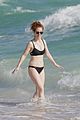 jess glynne wears black bikini on the beach 01