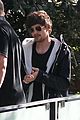 louis tomlinson steps out of hotel after sons birth 02